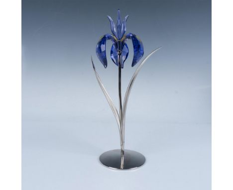 Stunning blue violet petals with segments of yellow. Beautifully joined to a silver-tone metal stem and leaf. Swarovski impre