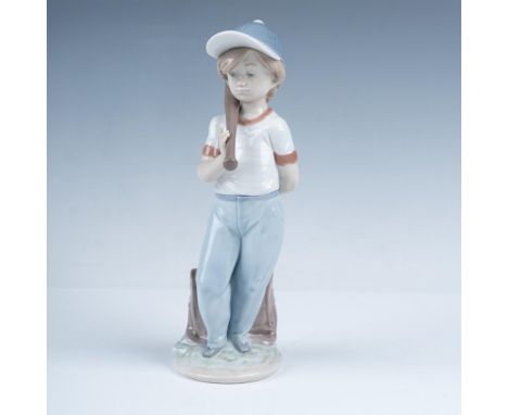 Glossy finish Collectors Society figurine from 1990. Depicts a somber boy with his bat on his shoulder and a ball held behind