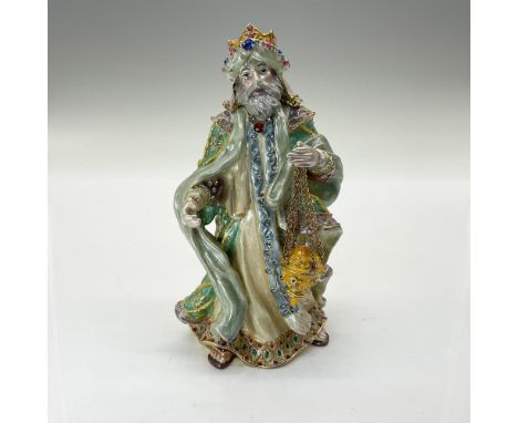 The Arabian Wise Man Figurine hand painted is incredibly detailed in pastel robes. This intricately crafted piece features ar