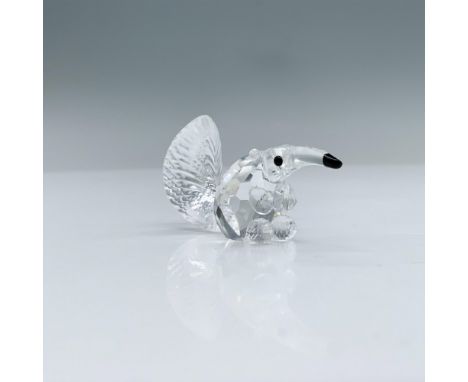 Miniature anteater made in clear crystal, its body is faceted, and the tail is molded. This item has its original box. Box me
