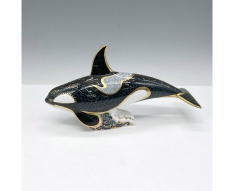 This marine mammal colored in deep blue, light blue with ocean water patterns highlighted by gilt outlines. Royal Crown Derby
