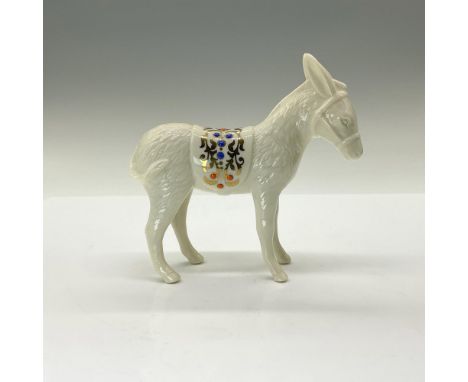 This beautiful donkey will add the perfect touch to your holiday Nativity scene. A demure yet noble figure with ears pinned a