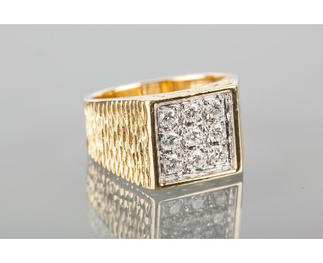 GENTLEMAN'S EIGHTEEN CARAT GOLD DIAMOND SET RING
the square bezel set with nine diamonds, size K (with sizing spheres)