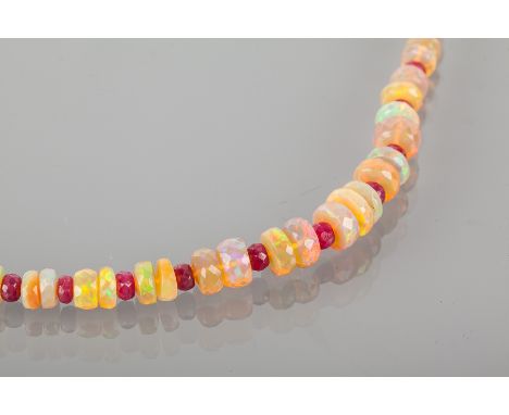 OPAL AND RUBY BEAD NECKLACE
with graduated faceted opal and ruby beads, with a nine carat gold clasp, 48cm long