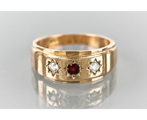 GENTLEMAN'S VICTORIAN STYLE RUBY AND WHITE GEM SET THREE STONE RING the bezel with star set stones, marked 375 for nine carat