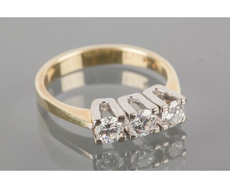 DIAMOND THREE STONE RING
the three brilliant cut diamonds totalling approximately 0.72 carats, marked 585 for fourteen carat 