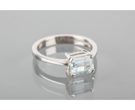 AQUAMARINE RING
set with an emerald cut aquamarine, in eighteen carat white gold, size O