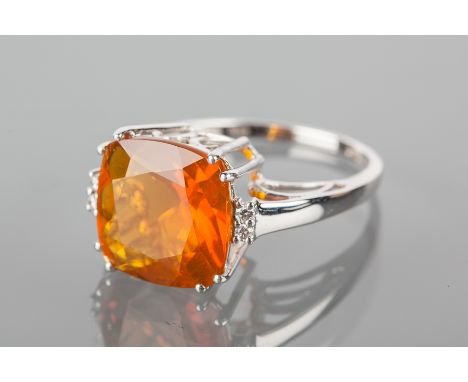 FOURTEEN CARAT GOLD FIRE OPAL AND DIAMOND RING
the mixed cut square fire opal 12mm across, in a high galleried setting, on di