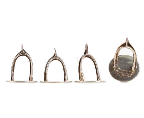 SET OF FOUR GEORGE V SILVER PLACENAME/MENU HOLDERS,maker Hamilton &amp; Inches, Edinburgh 1919, each modelled in the form of 