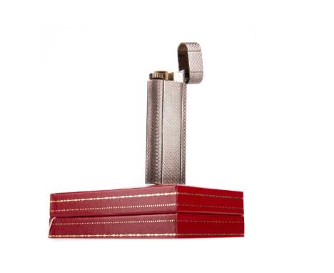MUST DE CARTIER SILVER PLATED LIGHTER,with engine turned decoration, 7cm high, in original fitted case 