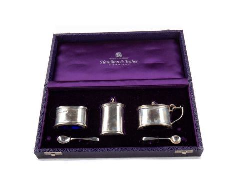 SILVER THREE PIECE CRUET SET,maker K. M. Silver, Birmingham 2001, of Regency design, comprising open salt, pepper pot and mus