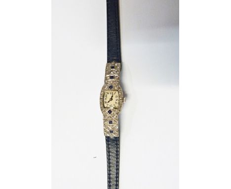 Art Deco platinum, diamond and sapphire cocktail watch with blue leather strap, six sapphires surrounded by a cluster of tiny