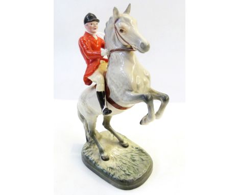 Beswick huntsman leaping on grey horse, no.868 