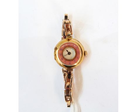 Lady's gold and enamel wristwatch, the pink enamel inscribed with Arabic numerals enclosing a white enamel dial 