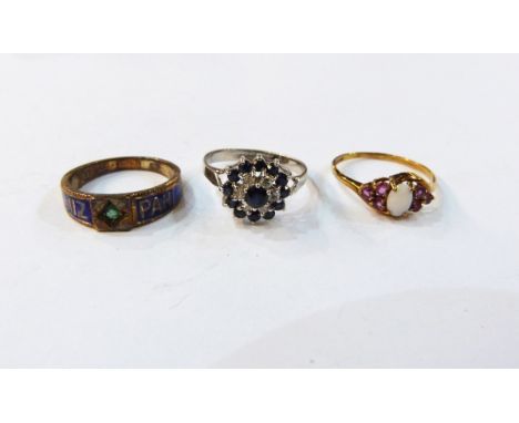 9ct white gold, sapphire and diamond cluster ring, a 9ct gold opal ring and a 9ct gold ring set with emerald and enamel decor