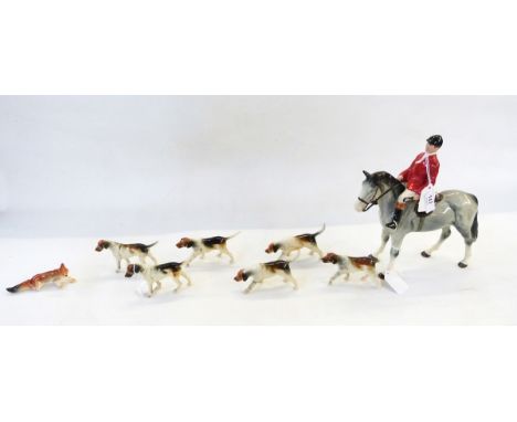 Set of Beswick-style hunt figures viz:- huntsman on grey horse, six hounds and fox (some damage) 