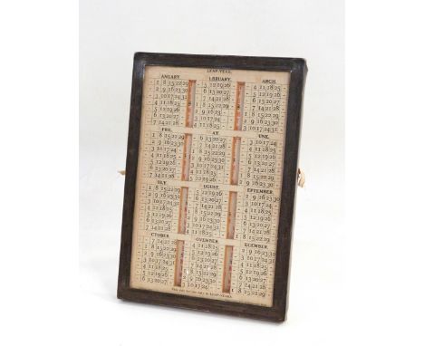 Perpetual calendar of rectangular form, in a silver easel frame, Birmingham 1917, 24.5cm x 17cm 