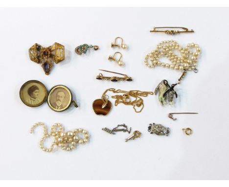 Graduated string of pearl necklace with a three diamond clasp, each diamond 2.5mm approx, a gold-coloured bar brooch set with