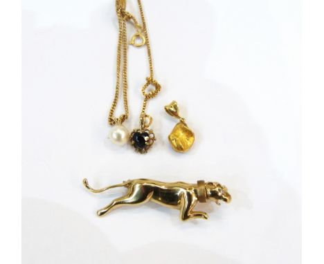 Gold coloured brooch of a leaping big cat with a gemset eye, marked 375, a 9ct gold curb-link chain hung with a cultured pear