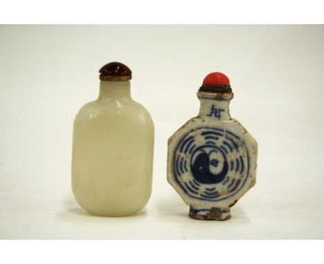 A white jade snuff bottle; and a blue porcelain snuff bottle, (2)