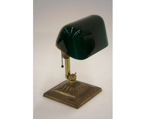 An early 20th Century adjustable brass student's desk lamp, with green glass shade, 27cm high