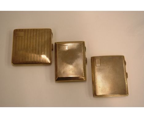 A silver and engine turned decorated cigarette case, Chester 1929; another similar, Birmingham 1935, inscribed "from Mary"; a