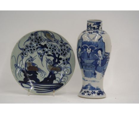 A 19th Century Chinese blue and white baluster vase, 26cm high; and a Chinese blue and white and under-glazed liver red sauce