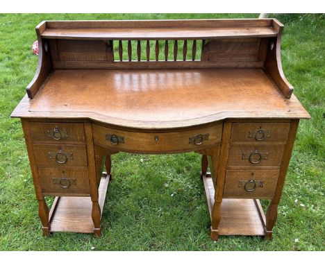 A fine quality Arts and Crafts period desk, atributed to Shapland & Petter  very clean good condition   drawers work fine ,  