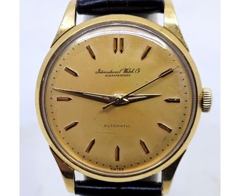 An IWC 18ct. gold gentleman's automatic wrist watch, c.1957, cal.852, having signed circular gold coloured dial with gold bat