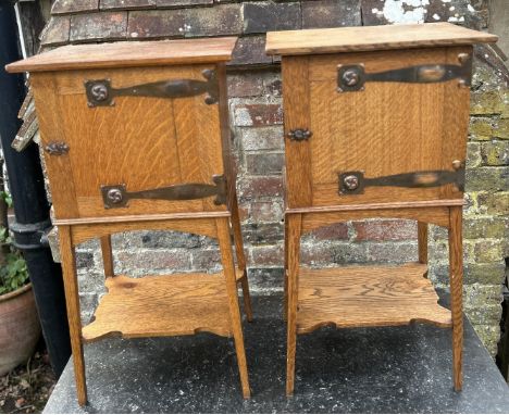A fine pair of Arts and Crafts Liberty style  oak pot cupboards   Both in good condition no ring marks 
