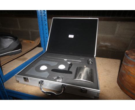 A novelty golf gift in fitted metal briefcase, as new 