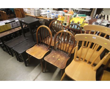 A set of four stick back kitchen chairs