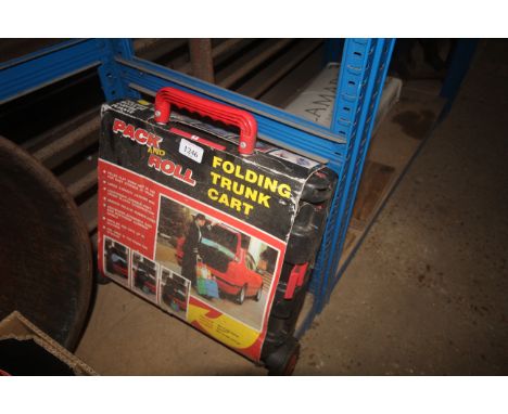 A Pack 'n' Roll folding trunk cart with original packaging