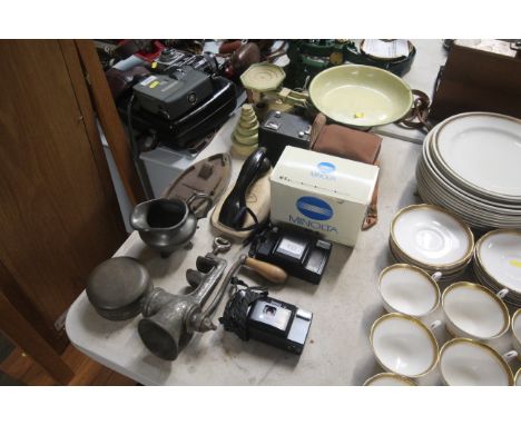A set of vintage kitchen scales, Box Brownie camera, various other cameras, a mincer etc.