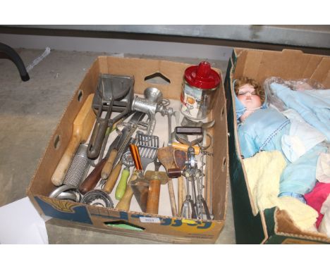 A box of miscellaneous vintage kitchen utensils