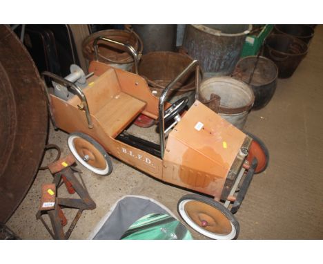 A child's Buddy pedal car fitted with rear winch (lacking cable) named to B.L.F.D.