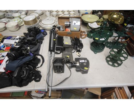 A Lubitel 2 camera, four vintage cine cameras, tripod etc.