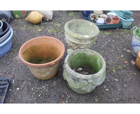 Two concrete planters and a large terracotta planter