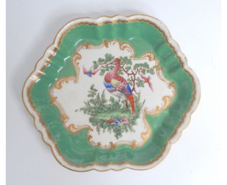 A Worcester  lobed hexagonal teapot stand, later decorated with colourful exotic birds in a garden, within rococo scrollwork,