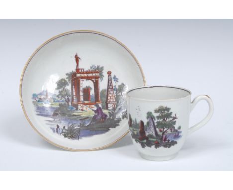 A Worcester coffee cup and saucer, printed after Robert Hancock in brownish black with `Ruins' , picked out in gilt and ename