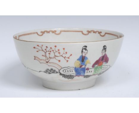 A Worcester bowl, brightly decorated with Chinese figures with two ladies in conversation and two boys playing, within a cont