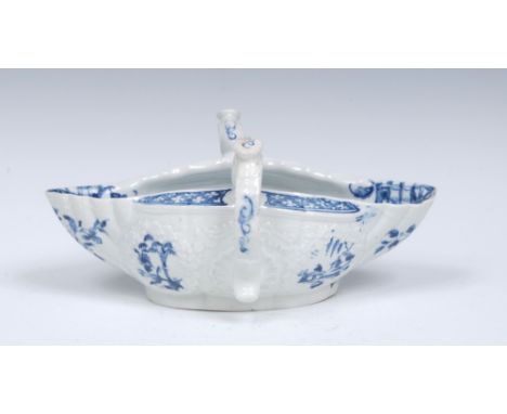 A  Worcester two-handled sauceboat, with flattened thumbrests, the exterior crisply moulded with four cartouches painted in c