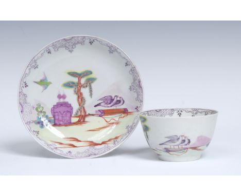 A  Worcester Valentine pattern tea bowl and saucer, decorated with  two doves perched on a quiver of arrows, two hearts on an