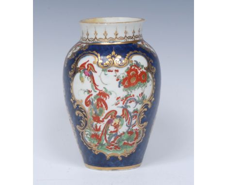 A Worcester Phoenix pattern ovoid vase, with mirror shaped reserves each decorated in the Kakiemon palette with phoenix risin