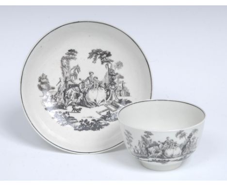 A Worcester L'Amour pattern tea bowl and saucer,  after an engraving by Robert Hancock, with a courting couple, her maid stan