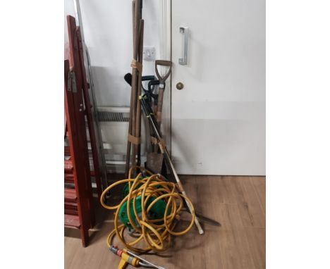 3 BUNDLES OF GARDEN TOOLS AND HOSE ON REEL