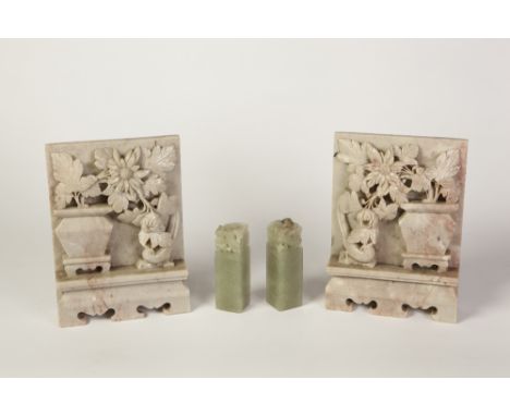 PAIR OF JADE COLOURED CARVED HARDSTONE PAPERWEIGHTS, each of oblong form with Dragon carved to the top, 3 1/4" (8.3cm) high, 