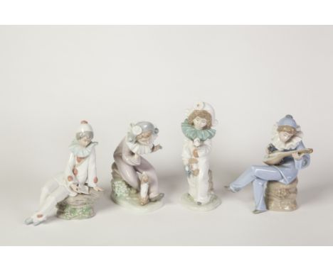 FOUR NAO, SPANISH PORCELAIN FIGURES OF YOUNG CLOWNS, three modelled seated, including one with a lute (loose), 8" (20.3cm) hi