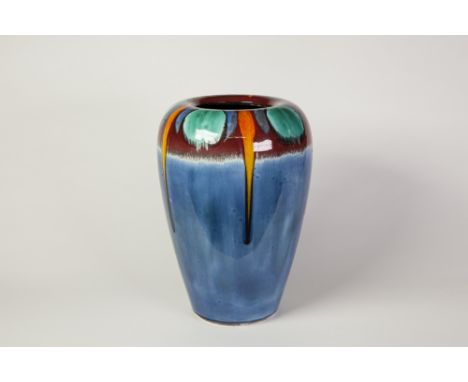 1970's POOLE POTTERY LARGE VASE, decorated in colours with a collar of circles and runnings on a pale blue ground, 13 1/4" (3