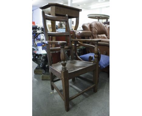 NINETEENTH CENTURY ELM OPEN ARMCHAIR, WITH LADDER RAIL BACK AND PANEL SEAT 